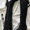 Botas negras corte largo