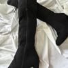 Botas negras corte largo